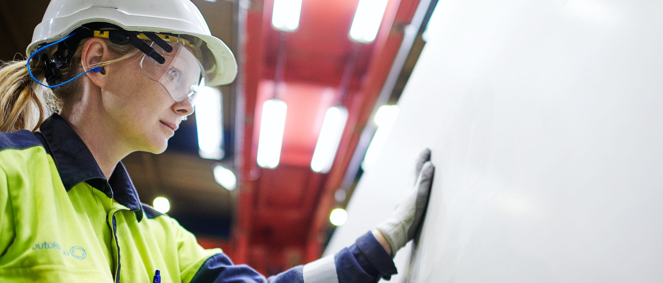 Outokumpu team member in production