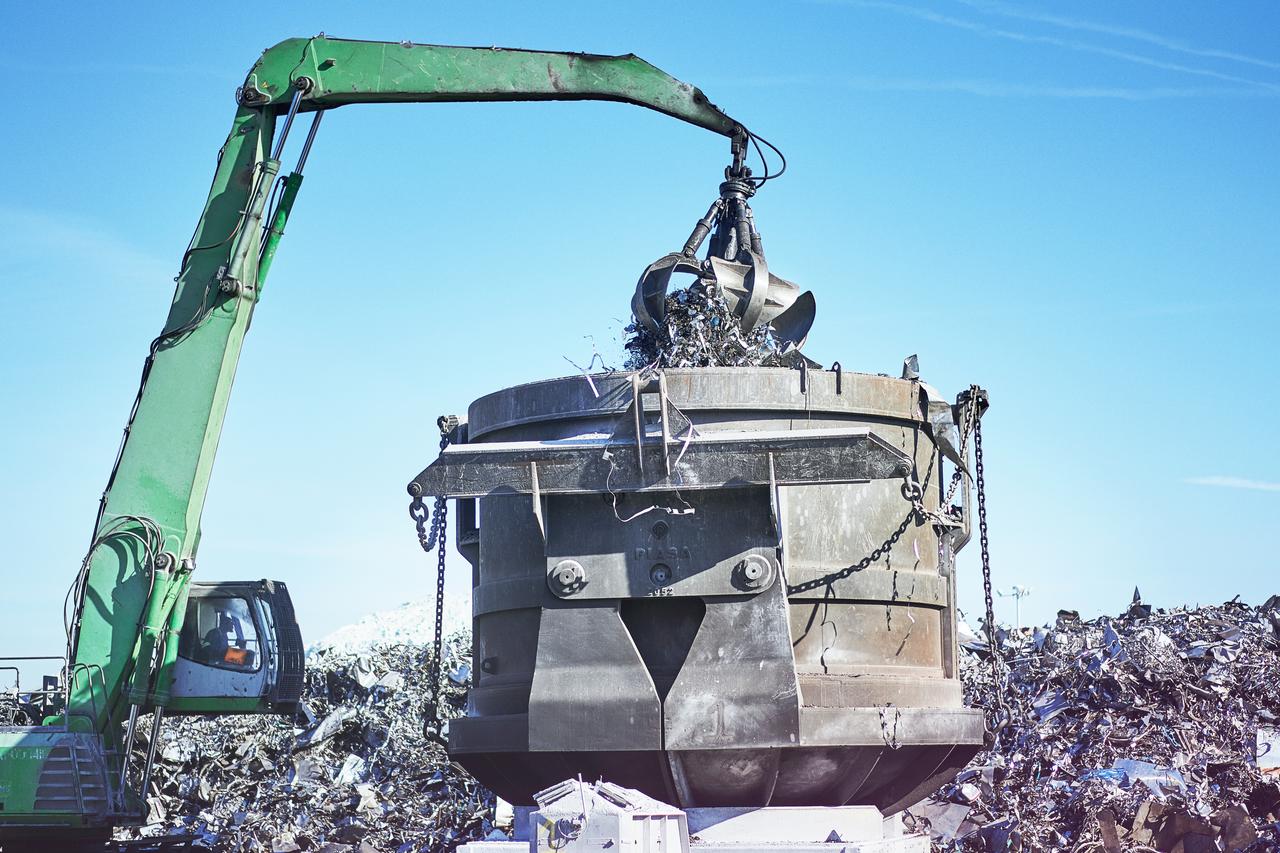 Scrap loading machinery green