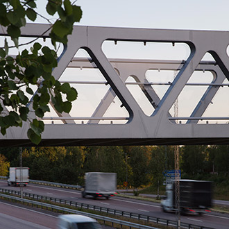 Detail of the side of a pedestrian bridge with see-through polycarbonate plates